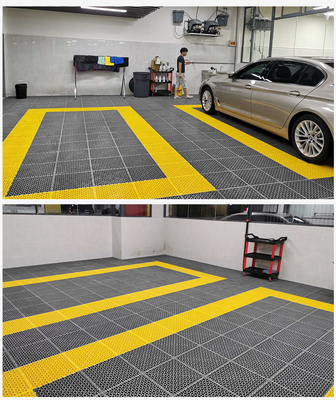 25 Jahre Lebensdauer PVC-Garage-Bodenfliesen bei Auto-Detailreinigungswerkstatt